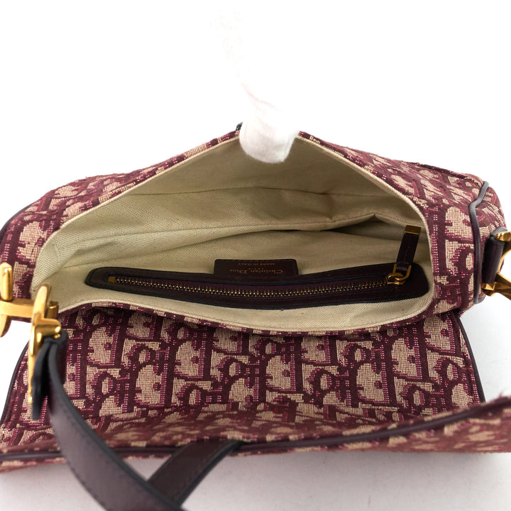 red oblique jacquard saddle bag
