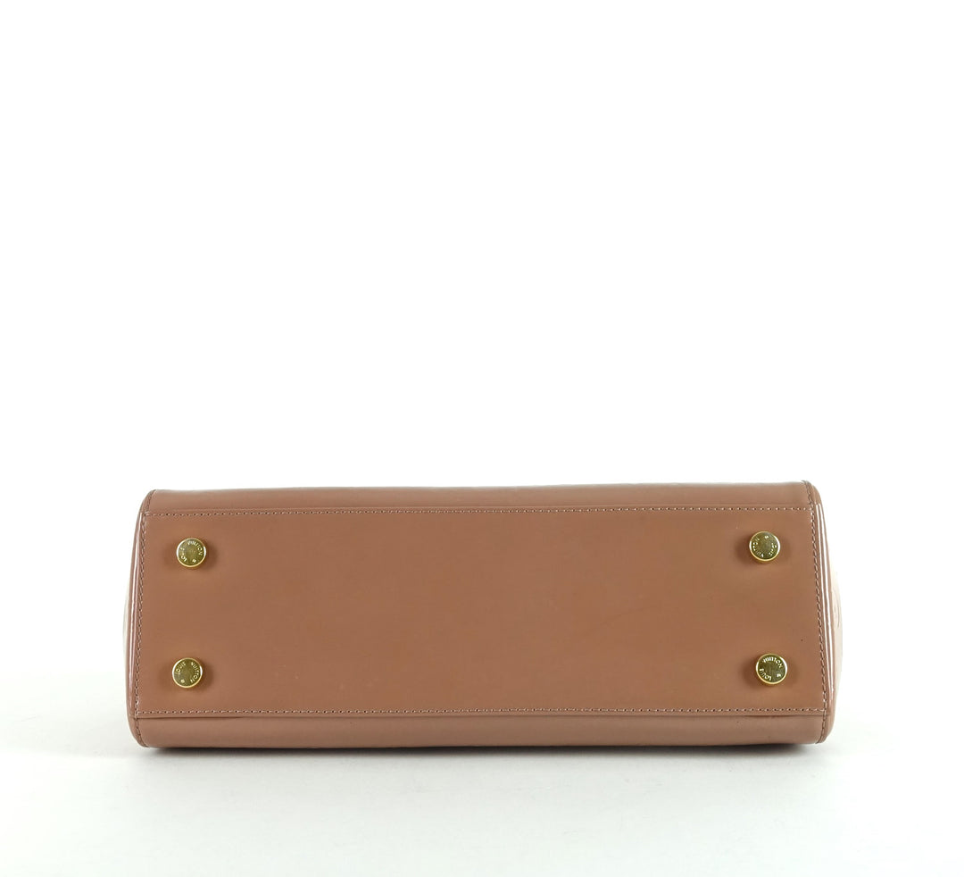 brea mm monogram vernis leather handbag