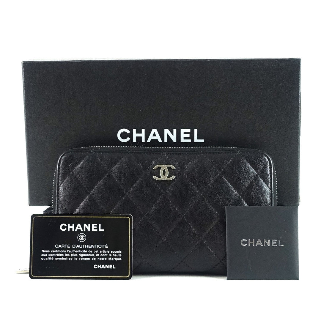 zipped wraparound quilted calfskin leather wallet