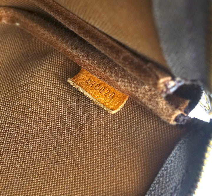 pochette accessoires monogram canvas bag with long strap