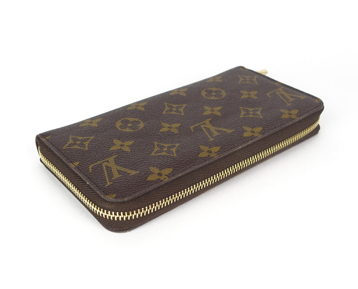 zippy monogram canvas wallet