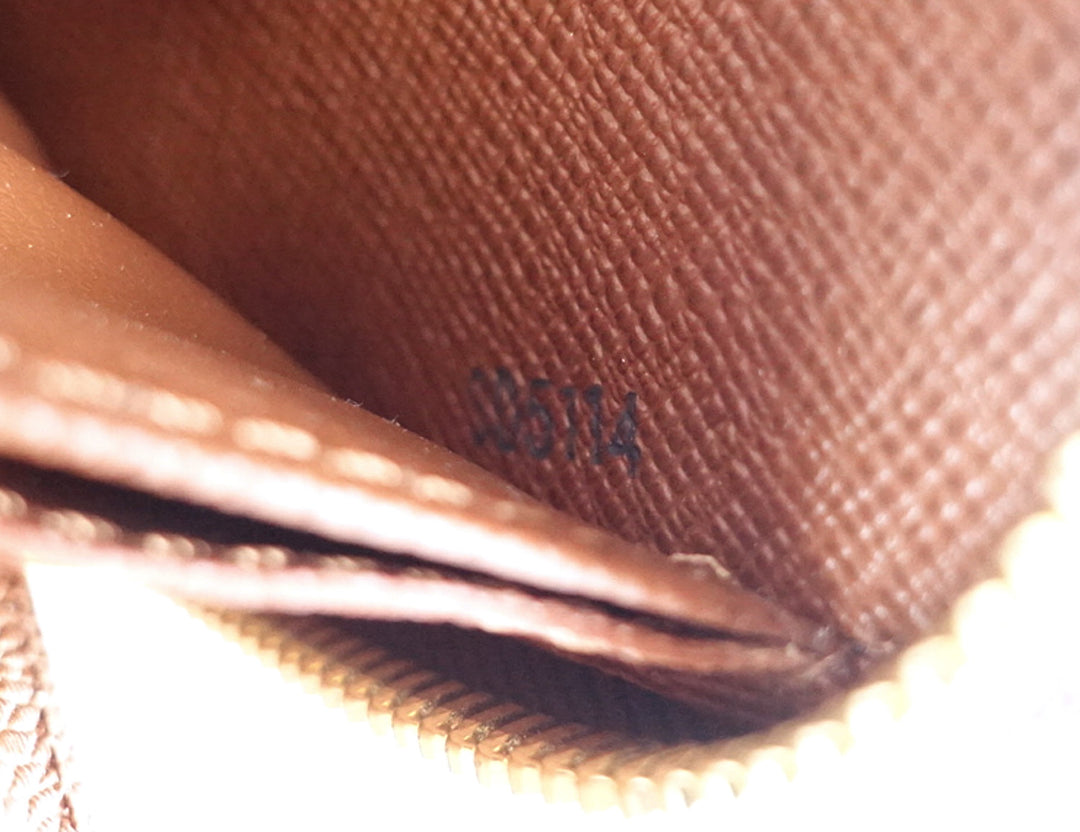 zippy monogram canvas wallet