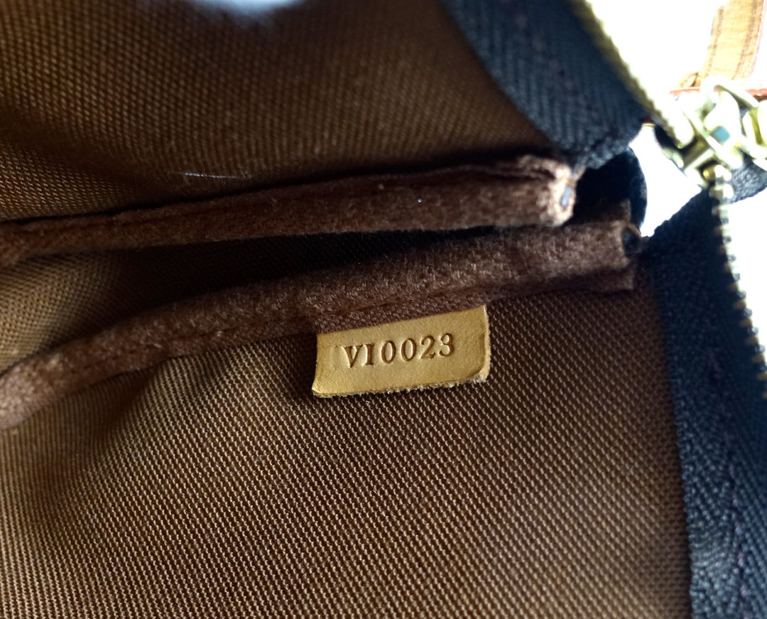 pochette accessoires monogram canvas evening bag